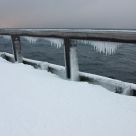Icicles on a rail