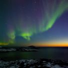 Aurora over a Crescent Moon