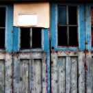Decaying blue doors