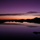 Sunrise over an Alpine Lake