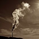 Backlit chimney smoke