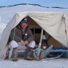 Inuit Dog sled driver