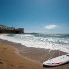Surfing on a solitary Beach