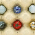 One tomato an five cristal balls