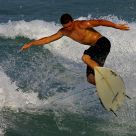 Escape Velocity - A surfer goes airborne.