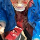 Painted clay beggar