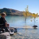 A boy and a duck, at Lake Tekapo