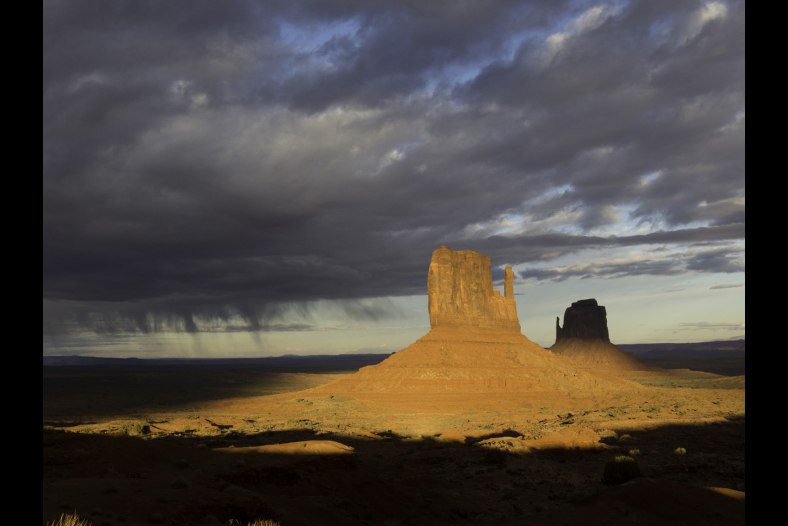 Rain falling at sunset by the Mittens