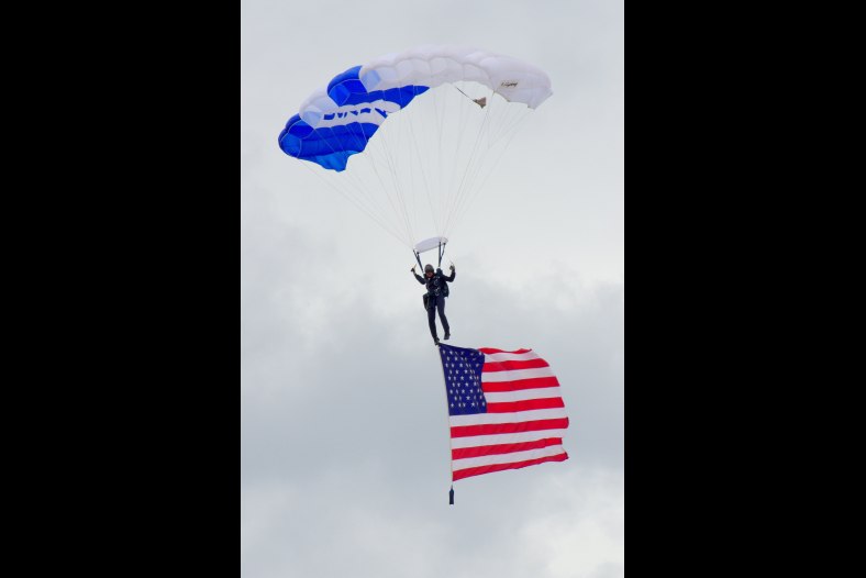 Jumping Off--Wings of Blue Parachute Team 