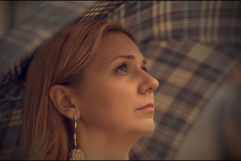 Under an umbrella