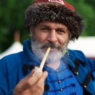 the man smoking a pipe