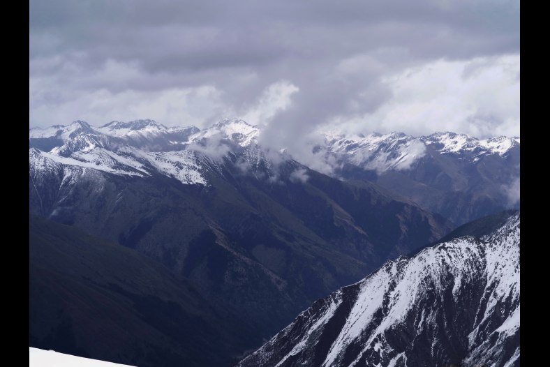 a far view at a peak of snow mountain