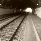 Rail and tunnel