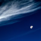 Moon under cover of light