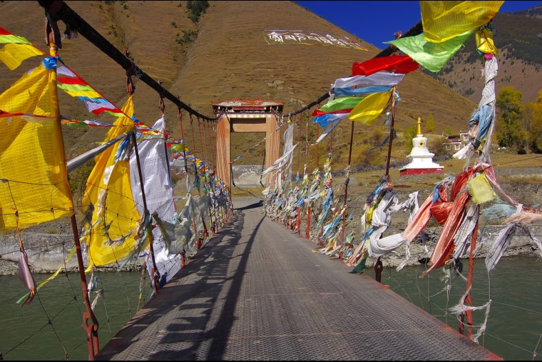 Prayer flags on bridge