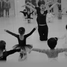 A dance teacher with children