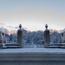 Snow lies like a shroud over Reichswald Forest War Cemetery at sunrise