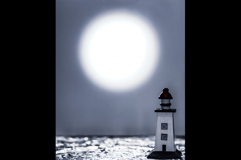 Lighthouse Under the Full Moon