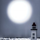 Lighthouse Under the Full Moon