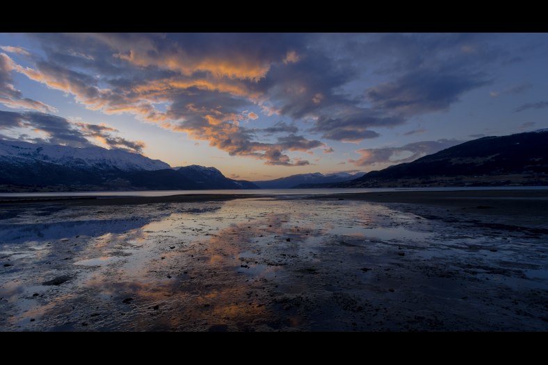 Mirrored clouds at low tide. Bukta birds sanctuary - Norway